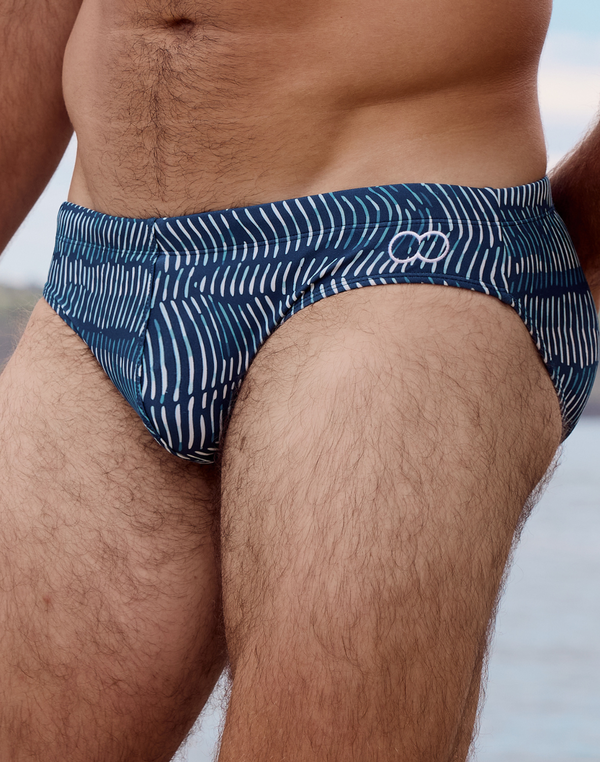 V10 Print Swim Brief - Naiad Navy